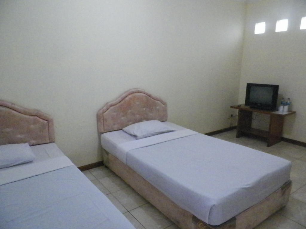 Hotel Puspa Sari Redpartner סיאטר חדר תמונה