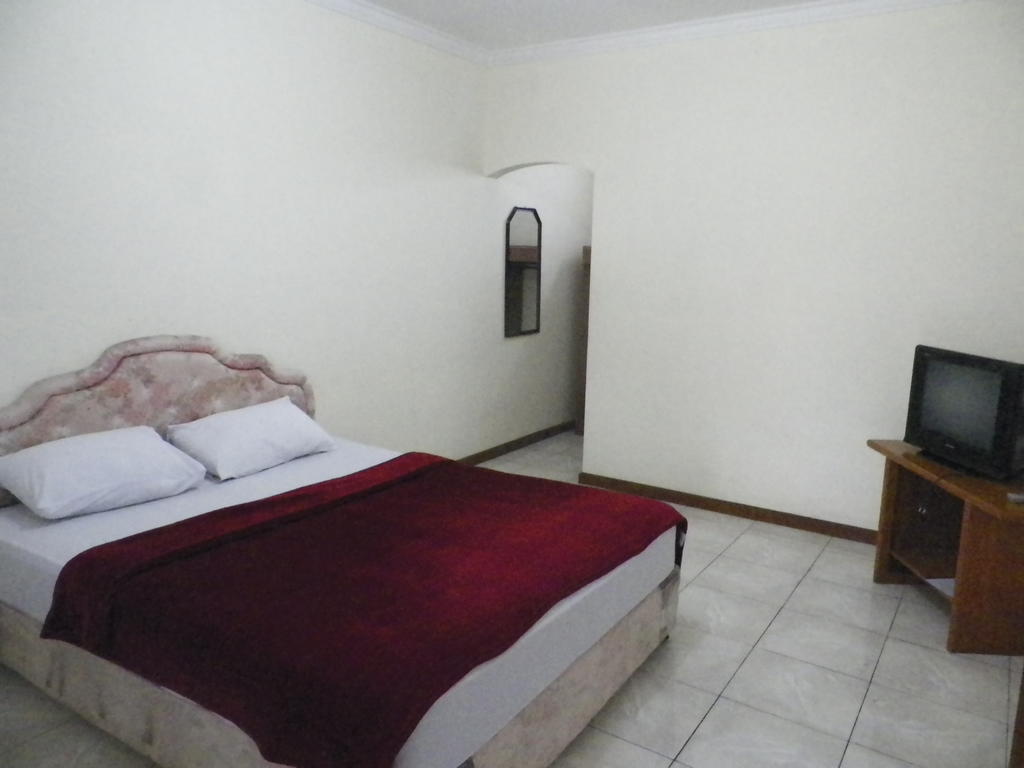 Hotel Puspa Sari Redpartner סיאטר חדר תמונה
